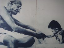 Gandhi w child smiling